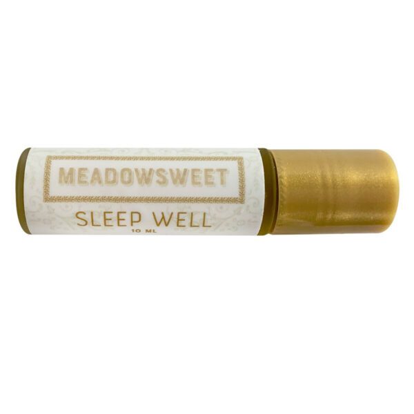 Small glass cylinder with gold lid and white label containing Sleep Well Balm.