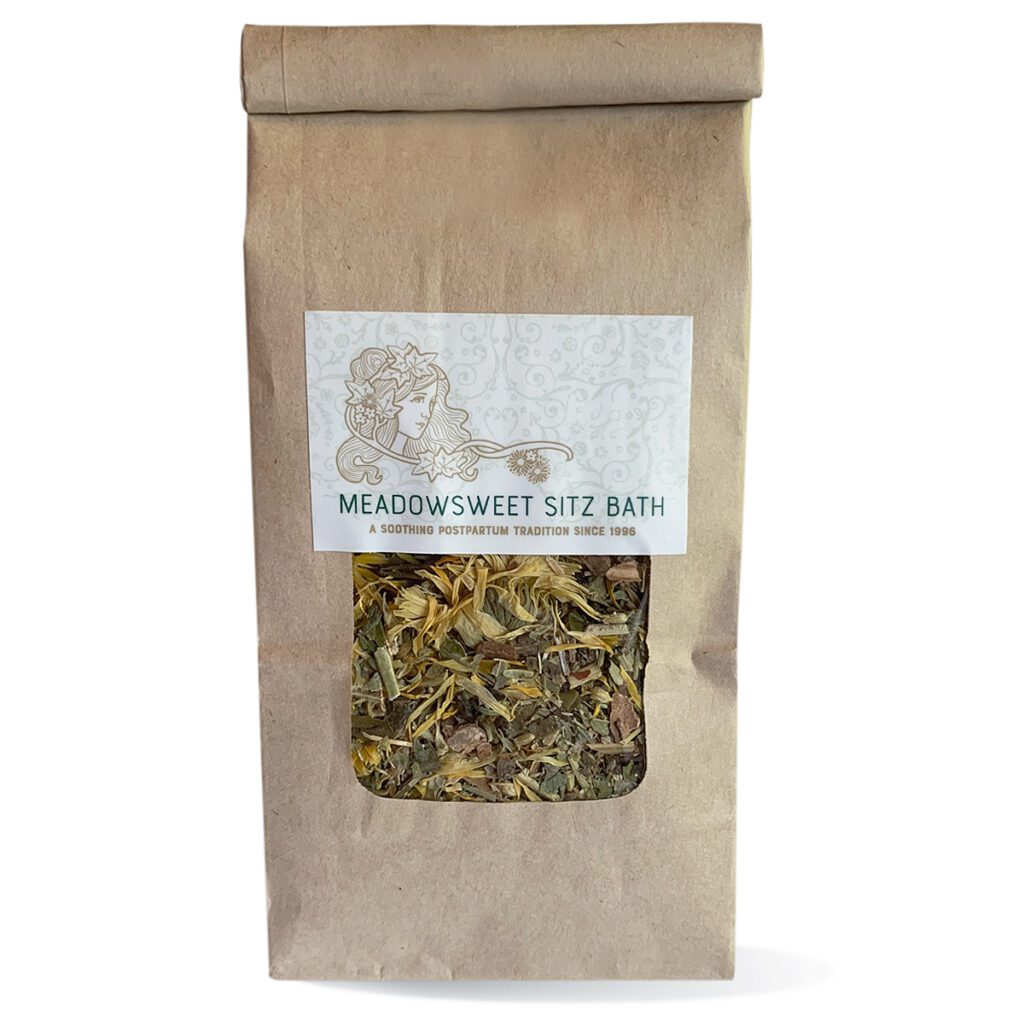 A brown paper bag with clear window containing Meadowsweet Sitz Bath.