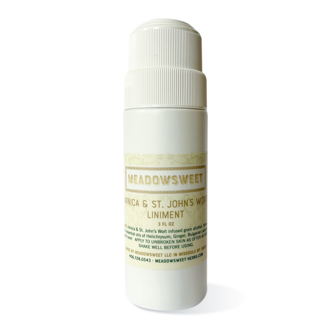 A large white plastic roller bottle contains 3 ounces of Arnica and St. John's Wort Liniment and essential oils
